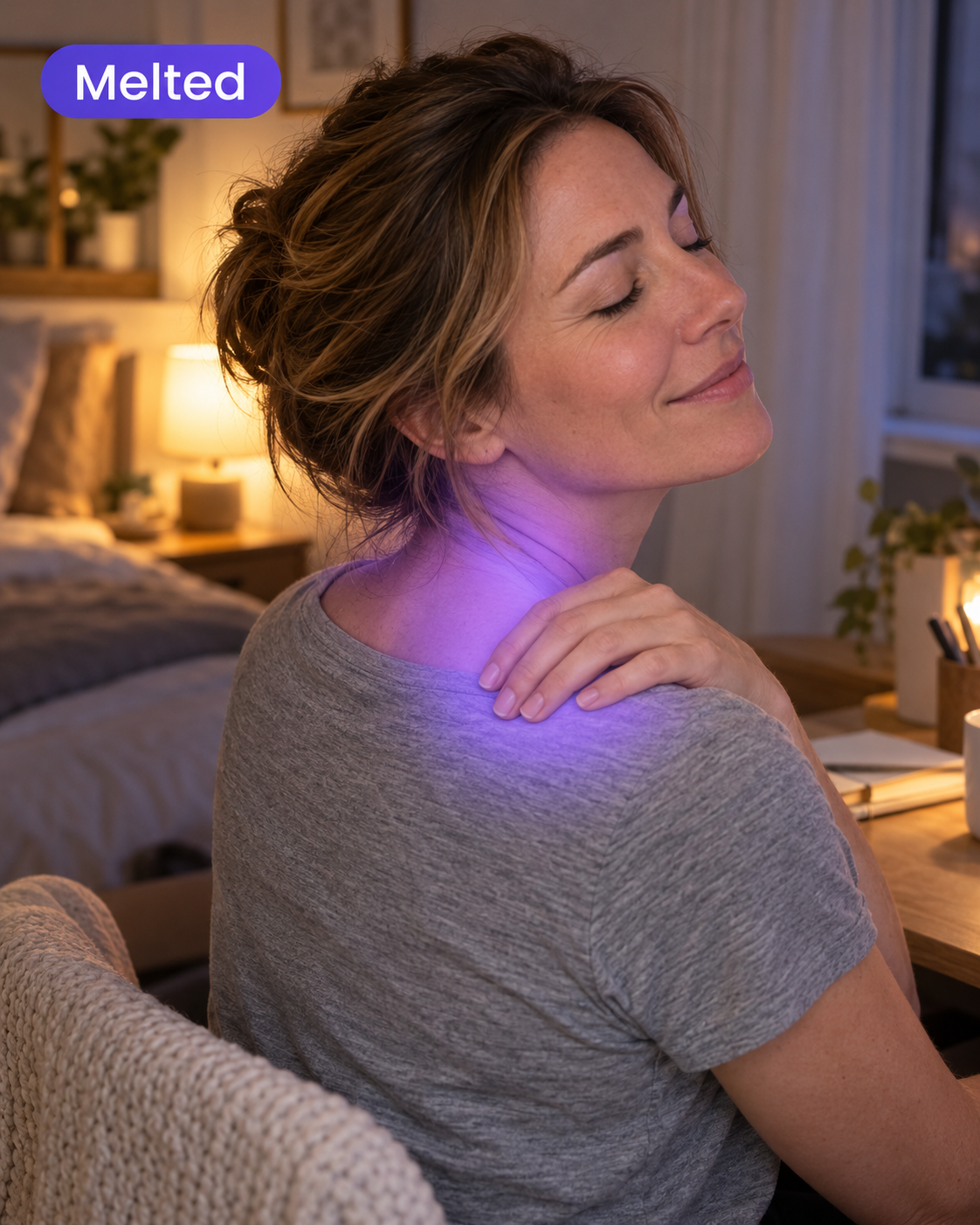 Woman relaxed after massaging her neck with KnotMelt